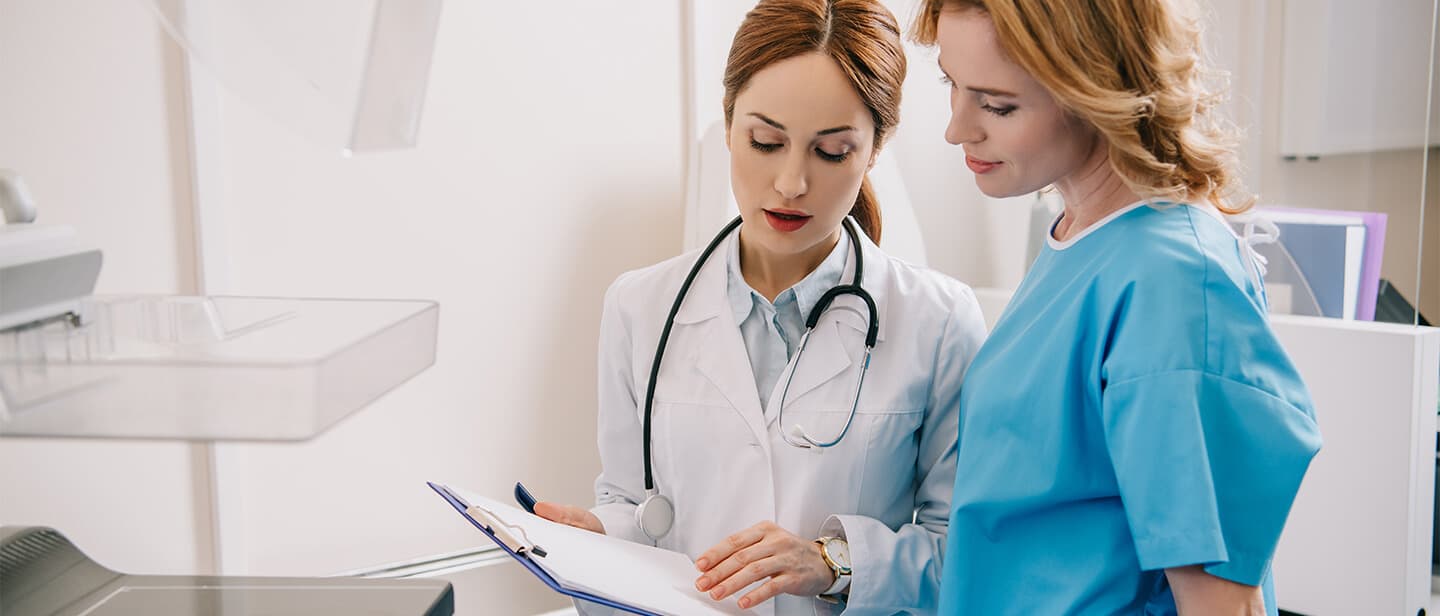 A local insurance advisor helping people review medicare guidance